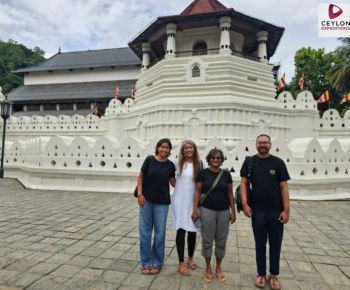 family-in-front-of-sri-dalada-maligawa-sacred-tooth-relic-temple-ceylon-expeditions